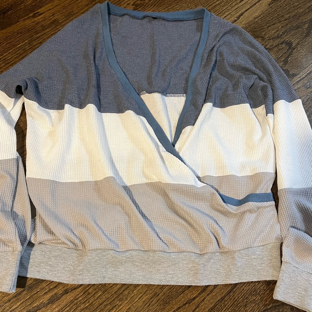 Blue, white, and gray wrap sweater